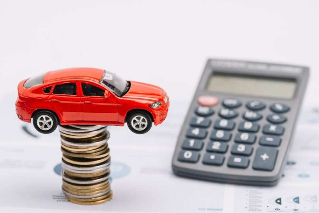 Toy car on stacked coins.