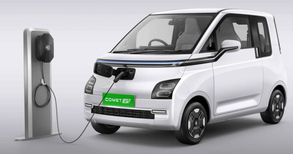 A compact white electric vehicle.