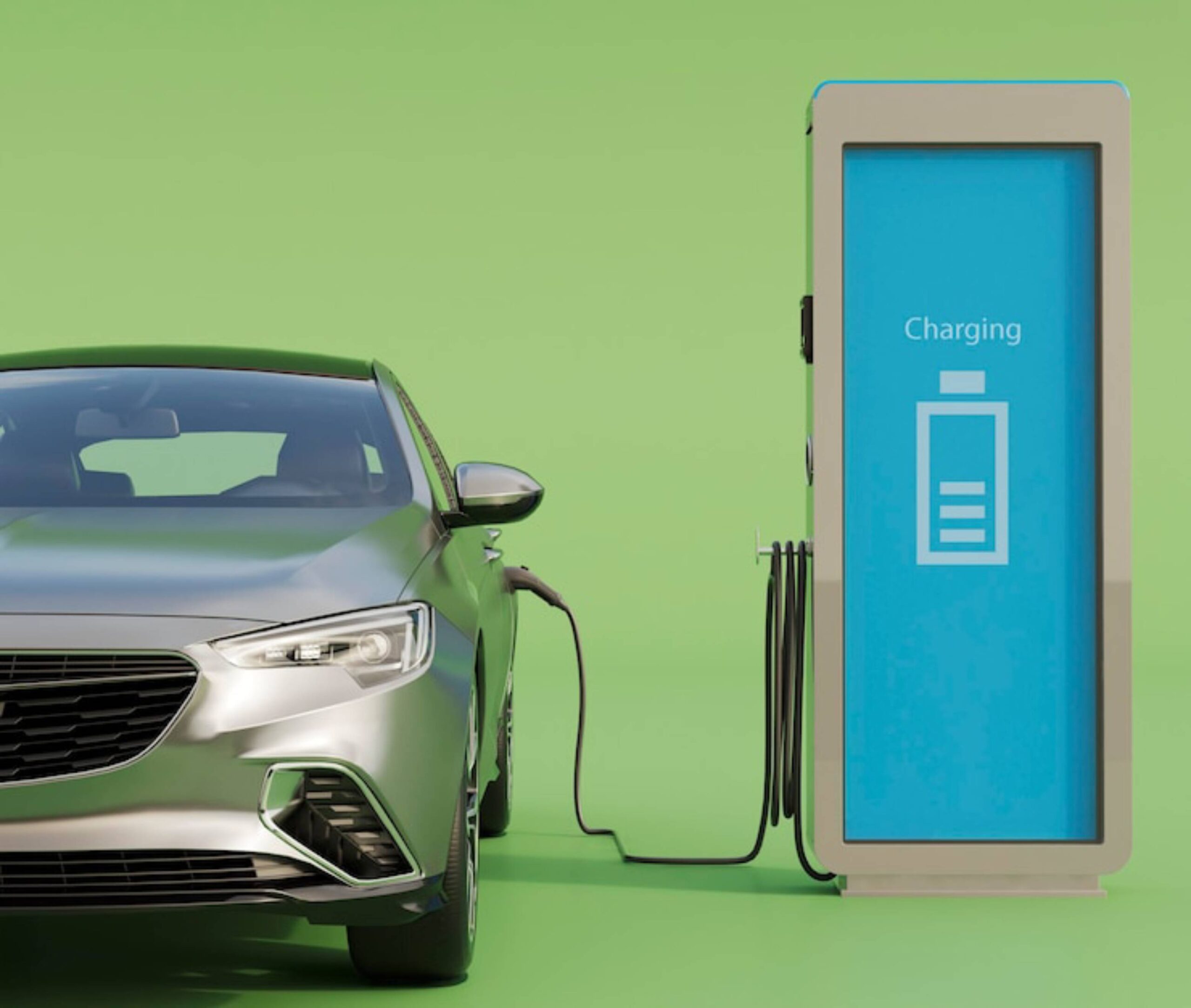 A silver electric car is plugged into a charging station.