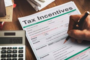 Chart displaying tax incentives for small businesses, emphasizing key advantages and requirements for eligibility.